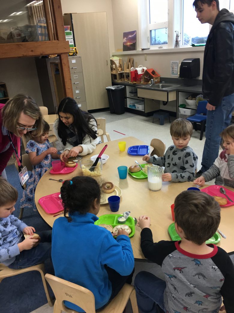 Early Learners at Newport High School Sharing a Meal